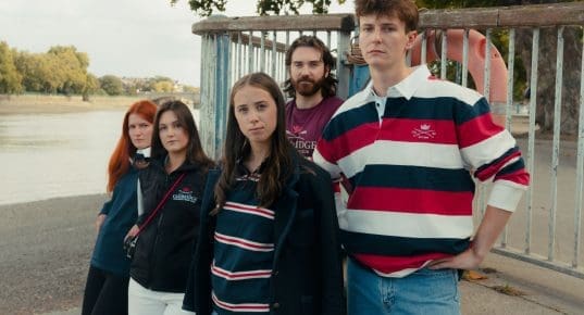 Group of people wearing Boat Race clothing range