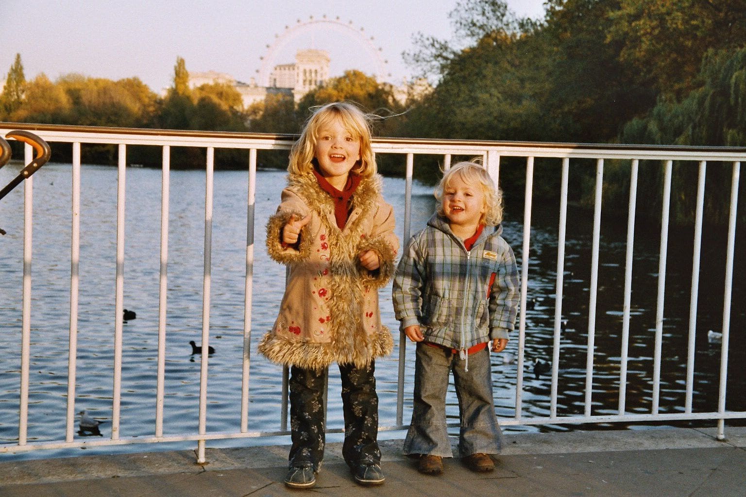 Two small girls by a lake in London