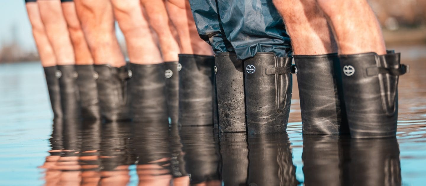 Oxford men wearing Le Chameau boots